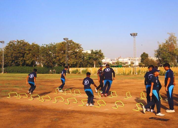 World-class cricket infrastructure at GRP Sports Academy Ahmedabad with 2 grounds, 16 nets, turf and astro turf wickets, and certified cricket coaches.